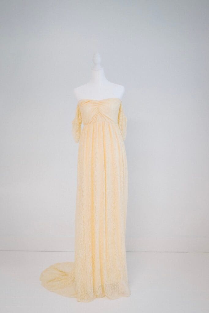 Flowing peach lace maternity gown, styled for motherhood photography in Bainbridge