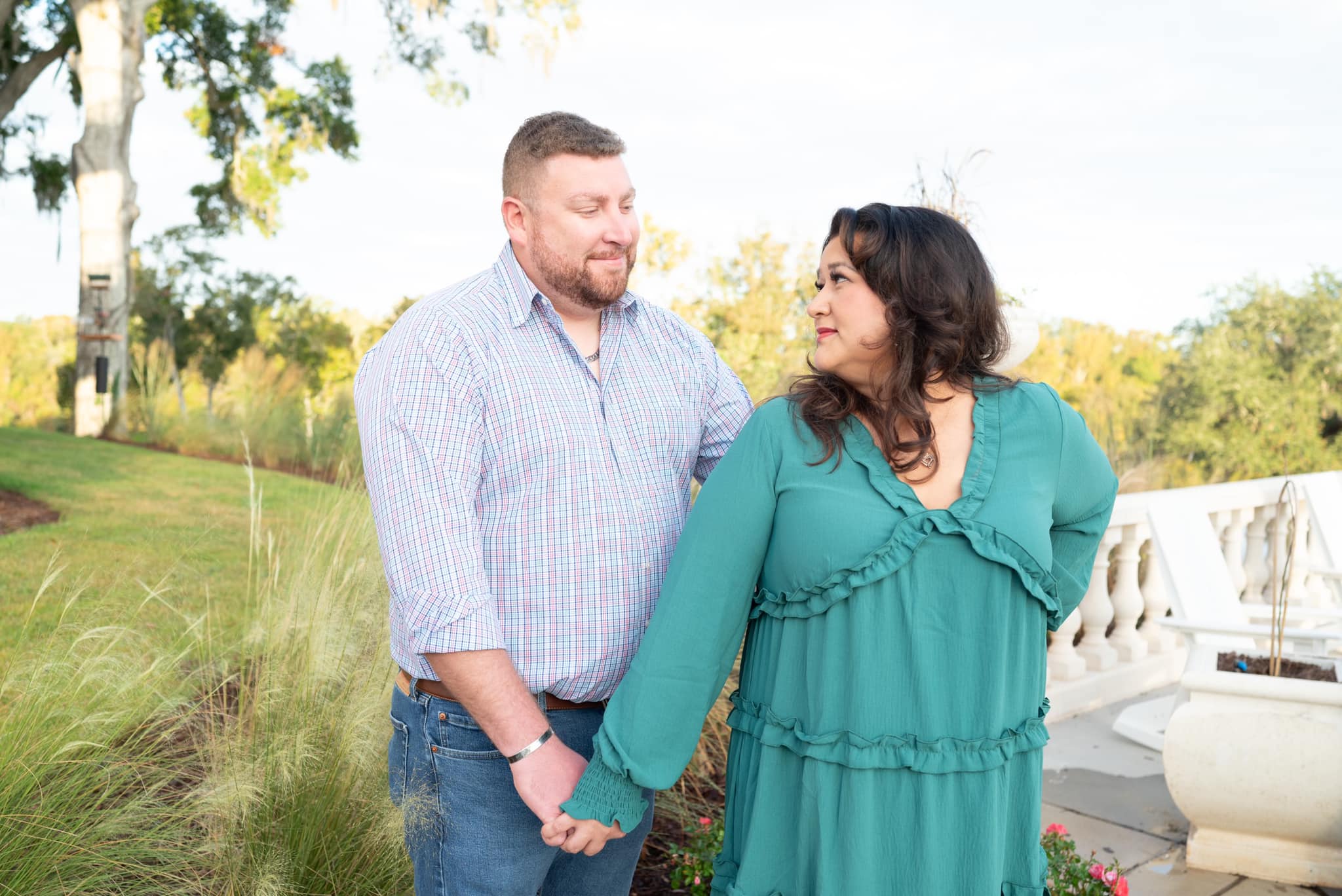 Couple enjoying outdoor fall petite sessions at Chason Park in Bainbridge.